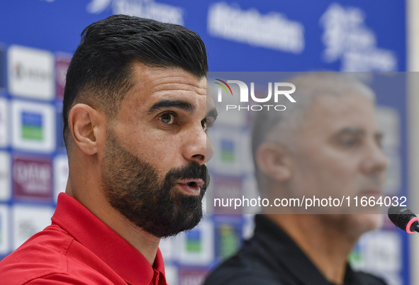 Palestine national team player Musab Battat attends a press conference at Jassim Bin Hamad Stadium in Doha, Qatar, on October 14, 2024, ahea...