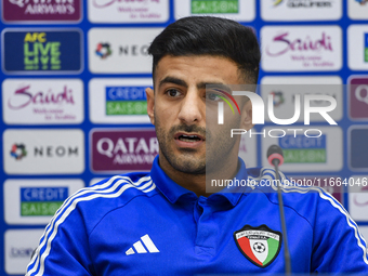 Kuwait team player Redha Abujabarah attends a press conference at Jassim Bin Hamad Stadium in Doha, Qatar, on October 14, 2024, ahead of the...