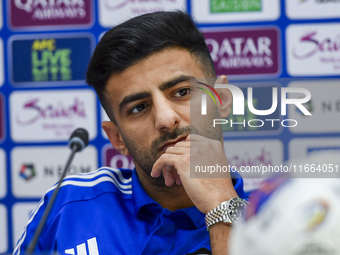 Kuwait team player Redha Abujabarah attends a press conference at Jassim Bin Hamad Stadium in Doha, Qatar, on October 14, 2024, ahead of the...