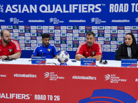 Kuwait team head coach Juan Pizzi (2nd R) and player Redha Abujabarah (2nd L) attend a press conference at Jassim Bin Hamad Stadium in Doha,...