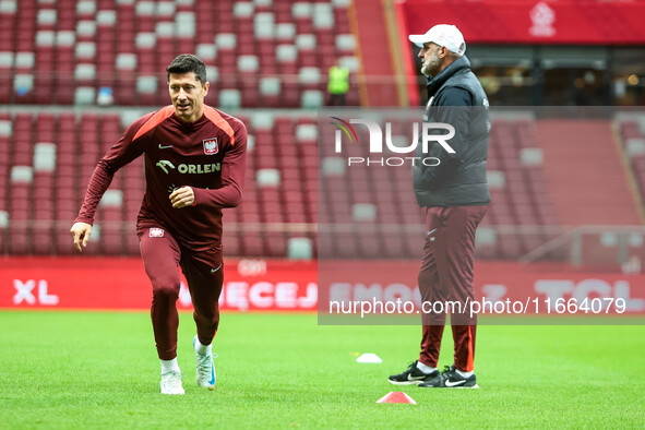 Robert Lewandowski, Coach Michal Probierz during training before UEFA Nations League match Poland vs Croatia in Warsaw Poland on 14 October...