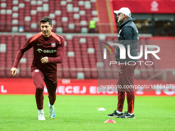 Robert Lewandowski, Coach Michal Probierz during training before UEFA Nations League match Poland vs Croatia in Warsaw Poland on 14 October...