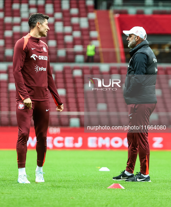 Robert Lewandowski, Coach Michal Probierz during training before UEFA Nations League match Poland vs Croatia in Warsaw Poland on 14 October...