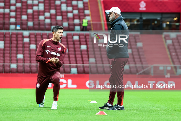 Robert Lewandowski, Coach Michal Probierz during training before UEFA Nations League match Poland vs Croatia in Warsaw Poland on 14 October...