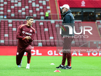 Robert Lewandowski, Coach Michal Probierz during training before UEFA Nations League match Poland vs Croatia in Warsaw Poland on 14 October...