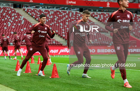 Robert Lewandowski, Krzysztof Piatek, Kacper Urbanski during training before UEFA Nations League match Poland vs Croatia in Warsaw Poland on...