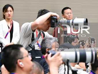 China's head coach Branko Ivankovic attends a pre-match press conference at Qingdao Youth Football Stadium in Qingdao, China, on October 14,...