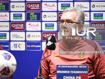 China's head coach Branko Ivankovic attends a pre-match press conference at Qingdao Youth Football Stadium in Qingdao, China, on October 14,...