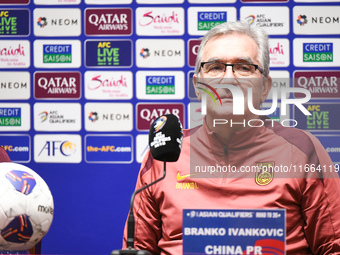 China's head coach Branko Ivankovic attends a pre-match press conference at Qingdao Youth Football Stadium in Qingdao, China, on October 14,...