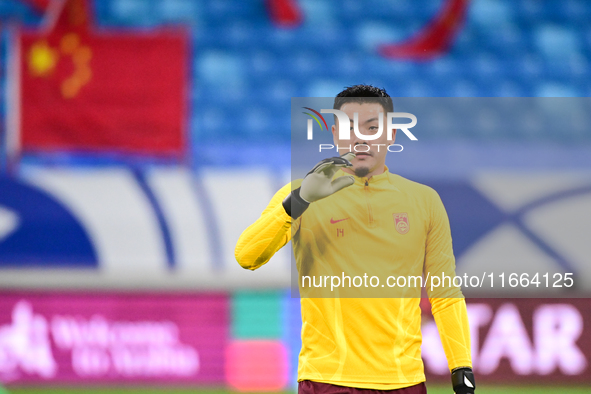 A photo taken on October 14, 2024, shows the Chinese football team during a training session at Qingdao Youth Football Stadium in Shandong p...