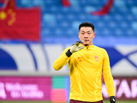 A photo taken on October 14, 2024, shows the Chinese football team during a training session at Qingdao Youth Football Stadium in Shandong p...