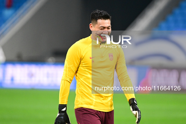 A photo taken on October 14, 2024, shows the Chinese football team during a training session at Qingdao Youth Football Stadium in Shandong p...