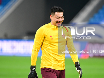 A photo taken on October 14, 2024, shows the Chinese football team during a training session at Qingdao Youth Football Stadium in Shandong p...