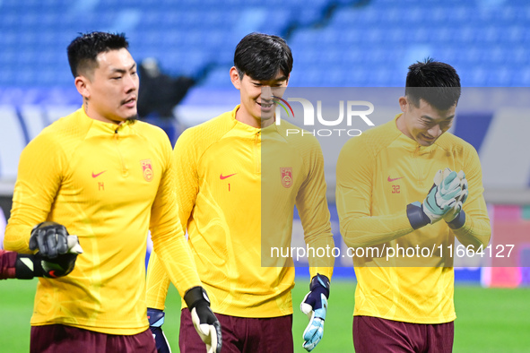 A photo taken on October 14, 2024, shows the Chinese football team during a training session at Qingdao Youth Football Stadium in Shandong p...