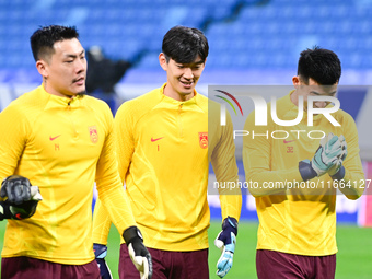 A photo taken on October 14, 2024, shows the Chinese football team during a training session at Qingdao Youth Football Stadium in Shandong p...