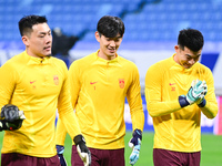 A photo taken on October 14, 2024, shows the Chinese football team during a training session at Qingdao Youth Football Stadium in Shandong p...