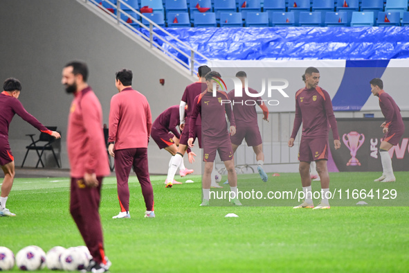 A photo taken on October 14, 2024, shows the Chinese football team during a training session at Qingdao Youth Football Stadium in Shandong p...