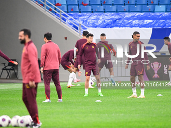 A photo taken on October 14, 2024, shows the Chinese football team during a training session at Qingdao Youth Football Stadium in Shandong p...