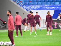 A photo taken on October 14, 2024, shows the Chinese football team during a training session at Qingdao Youth Football Stadium in Shandong p...