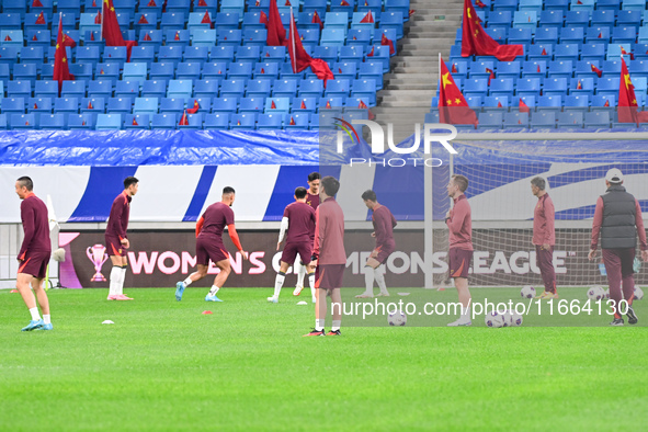 A photo taken on October 14, 2024, shows the Chinese football team during a training session at Qingdao Youth Football Stadium in Shandong p...