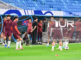 A photo taken on October 14, 2024, shows the Chinese football team during a training session at Qingdao Youth Football Stadium in Shandong p...