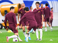 A photo taken on October 14, 2024, shows the Chinese football team during a training session at Qingdao Youth Football Stadium in Shandong p...