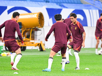 A photo taken on October 14, 2024, shows the Chinese football team during a training session at Qingdao Youth Football Stadium in Shandong p...