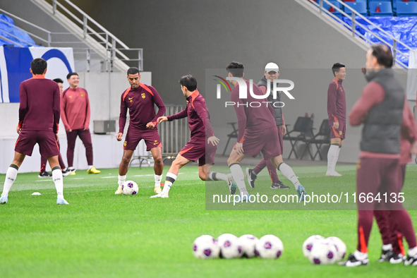 A photo taken on October 14, 2024, shows the Chinese football team during a training session at Qingdao Youth Football Stadium in Shandong p...