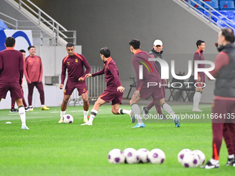 A photo taken on October 14, 2024, shows the Chinese football team during a training session at Qingdao Youth Football Stadium in Shandong p...