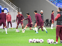 A photo taken on October 14, 2024, shows the Chinese football team during a training session at Qingdao Youth Football Stadium in Shandong p...