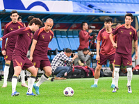 A photo taken on October 14, 2024, shows the Chinese football team during a training session at Qingdao Youth Football Stadium in Shandong p...