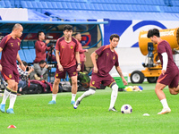 A photo taken on October 14, 2024, shows the Chinese football team during a training session at Qingdao Youth Football Stadium in Shandong p...