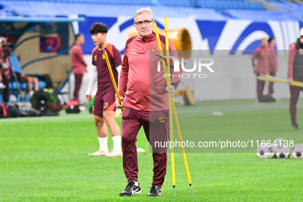 A photo taken on October 14, 2024, shows the Chinese football team during a training session at Qingdao Youth Football Stadium in Shandong p...