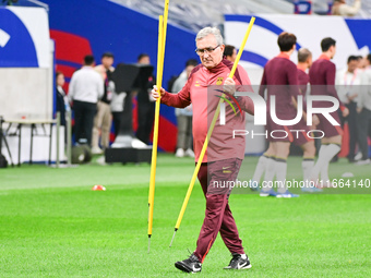 A photo taken on October 14, 2024, shows the Chinese football team during a training session at Qingdao Youth Football Stadium in Shandong p...