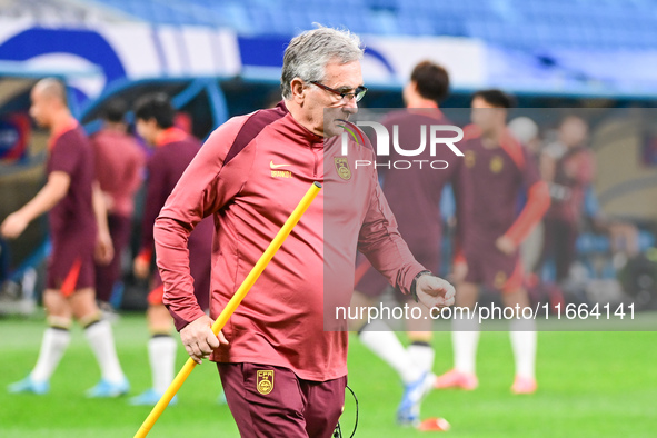 A photo taken on October 14, 2024, shows the Chinese football team during a training session at Qingdao Youth Football Stadium in Shandong p...