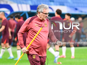 A photo taken on October 14, 2024, shows the Chinese football team during a training session at Qingdao Youth Football Stadium in Shandong p...