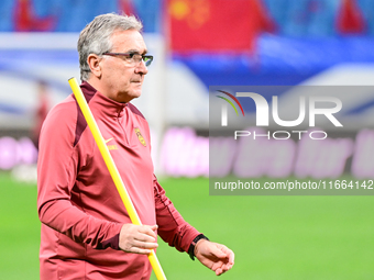 A photo taken on October 14, 2024, shows the Chinese football team during a training session at Qingdao Youth Football Stadium in Shandong p...