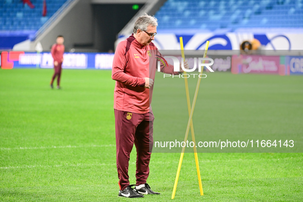 A photo taken on October 14, 2024, shows the Chinese football team during a training session at Qingdao Youth Football Stadium in Shandong p...