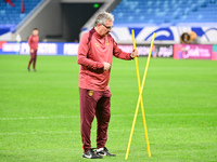 A photo taken on October 14, 2024, shows the Chinese football team during a training session at Qingdao Youth Football Stadium in Shandong p...