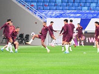 A photo taken on October 14, 2024, shows the Chinese football team during a training session at Qingdao Youth Football Stadium in Shandong p...