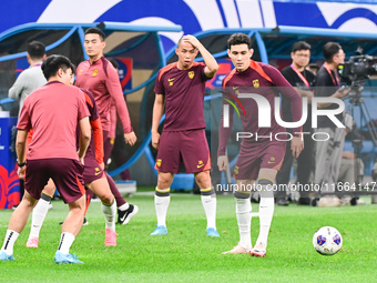 A photo taken on October 14, 2024, shows the Chinese football team during a training session at Qingdao Youth Football Stadium in Shandong p...