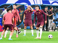 A photo taken on October 14, 2024, shows the Chinese football team during a training session at Qingdao Youth Football Stadium in Shandong p...