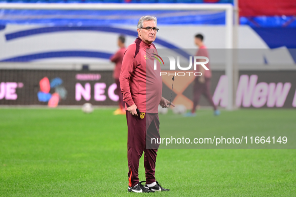 A photo taken on October 14, 2024, shows the Chinese football team during a training session at Qingdao Youth Football Stadium in Shandong p...