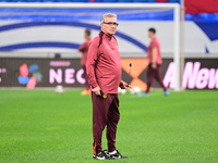 A photo taken on October 14, 2024, shows the Chinese football team during a training session at Qingdao Youth Football Stadium in Shandong p...