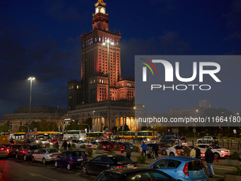 Cars are seen parked at the central train station in front of the Palace of Culture and Sciences in Warsaw, Poland on 12 October, 2024. (