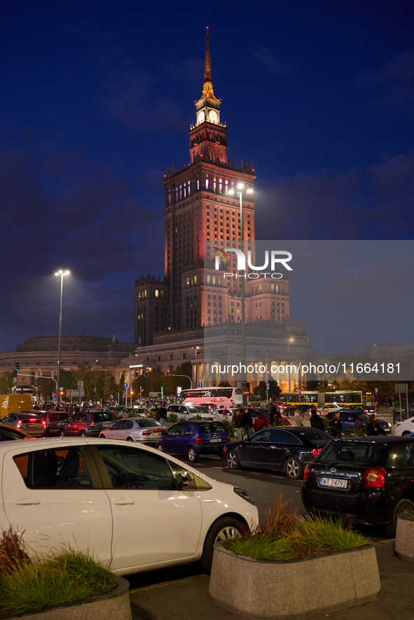 Cars are seen parked at the central train station in front of the Palace of Culture and Sciences in Warsaw, Poland on 12 October, 2024. 