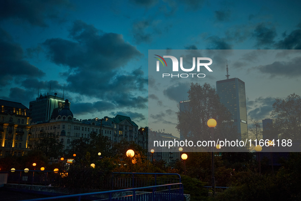 Street lights are seen during sunset in Warsaw, Poland on 12 October, 2024. 