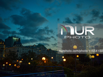 Street lights are seen during sunset in Warsaw, Poland on 12 October, 2024. (