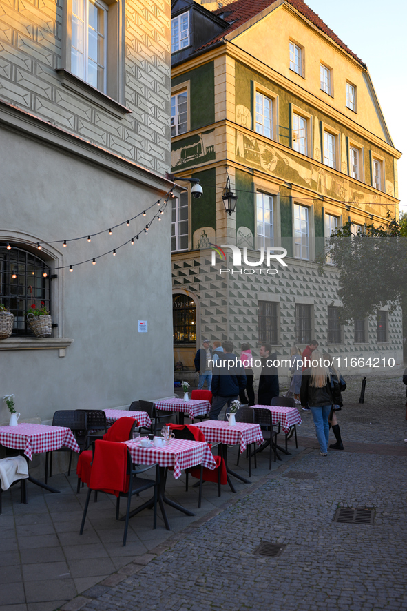 Tables are seen outside a restaurant in Warsaw, Poland on 12 October, 2024. 