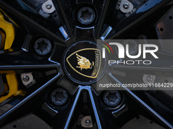 A Lamborghini logo is seen on the wheel of a Lamborghini Urus SUV car in Warsaw, Poland on 12 October, 2024. (